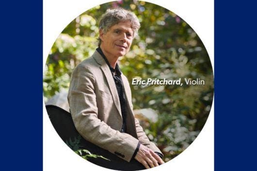 Eric Pritchard looks at the camera, to his right.